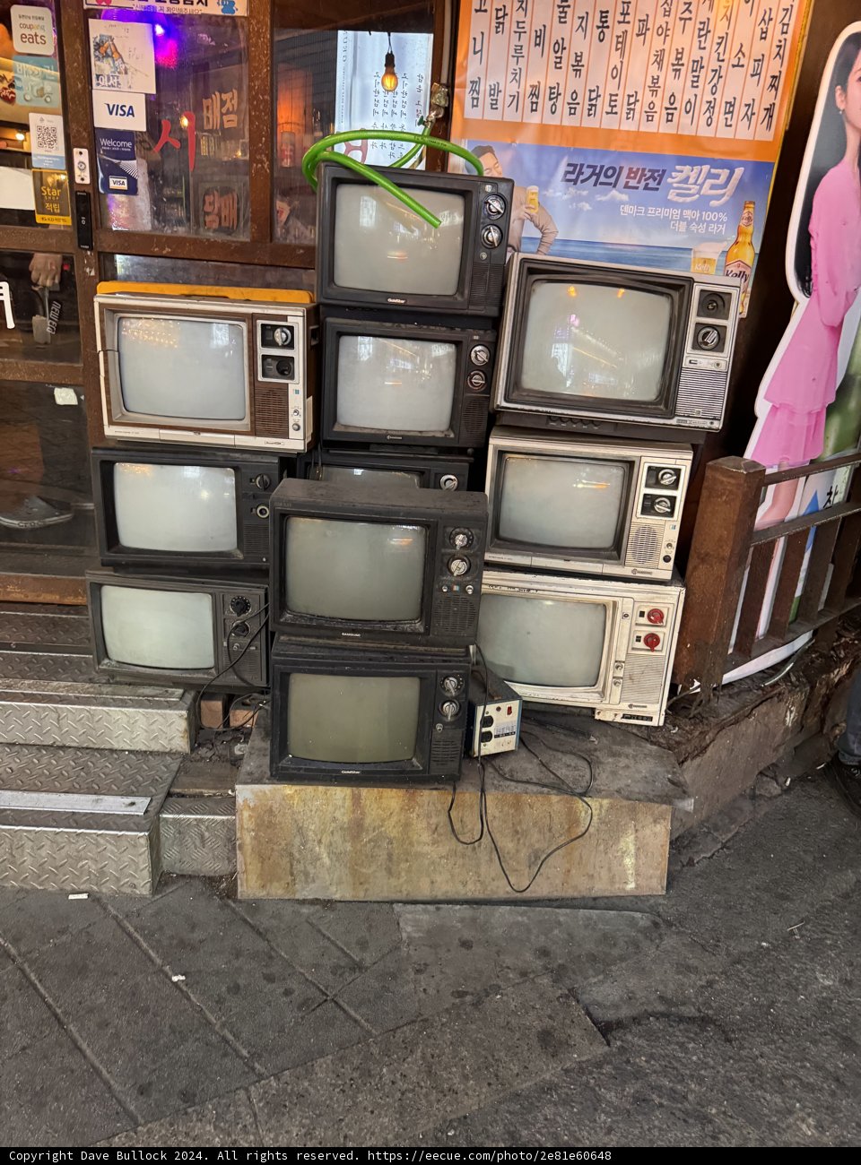 Vintage Television Collection on Seoul Sidewalk