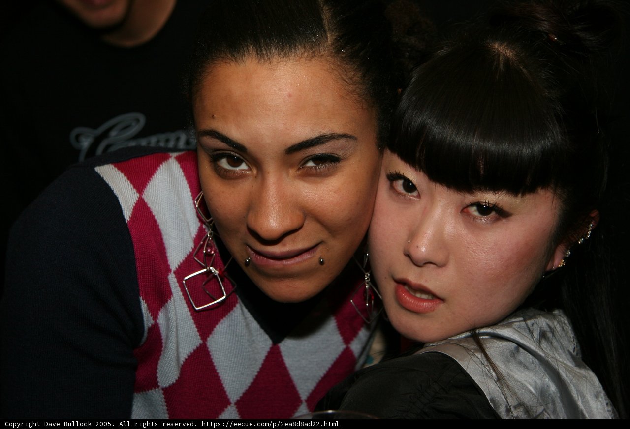 Two young women posing for a portrait