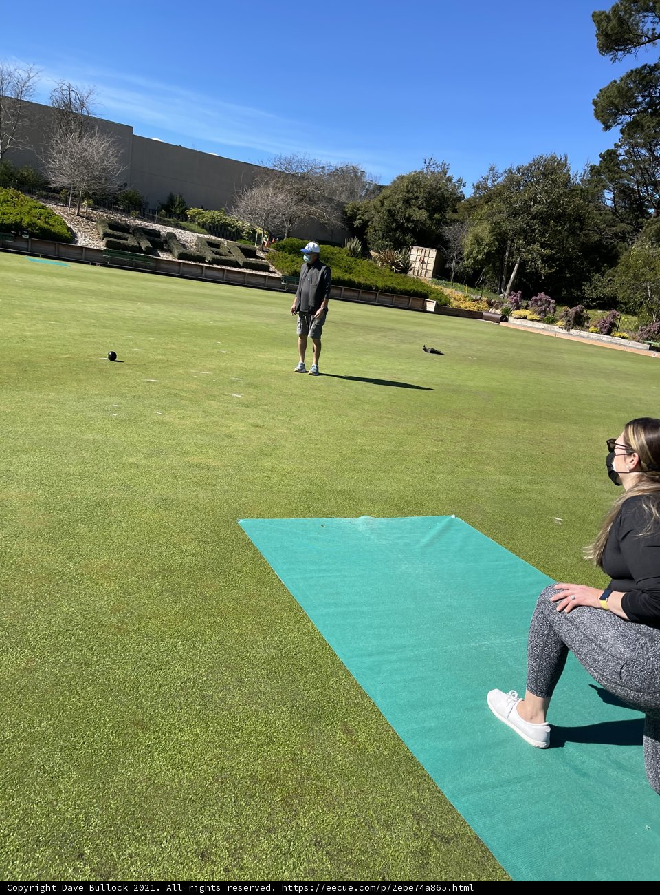 Practicing Her Swing on the Green