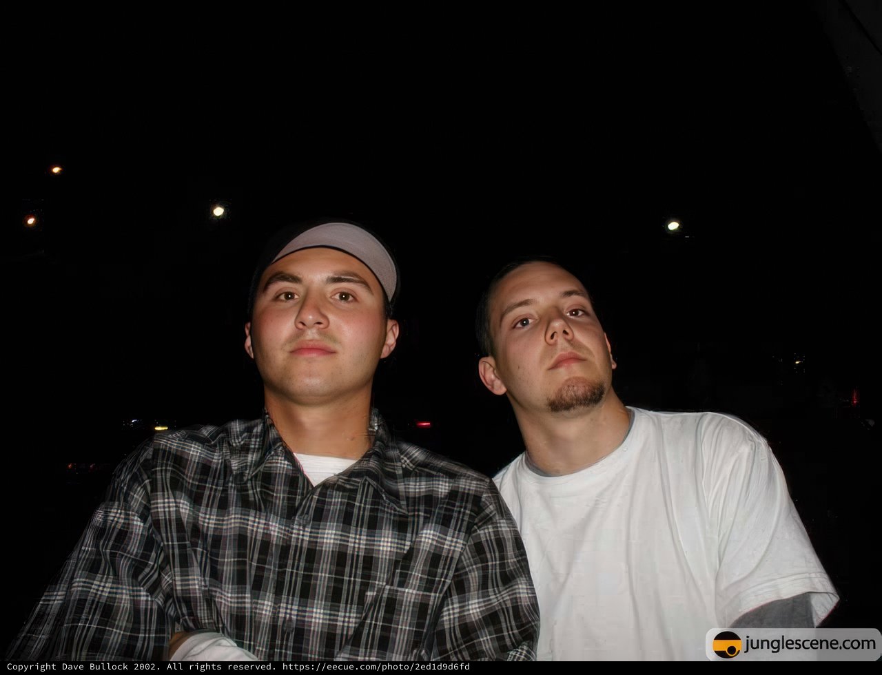 Night Portrait of Two Men in Baseball Caps