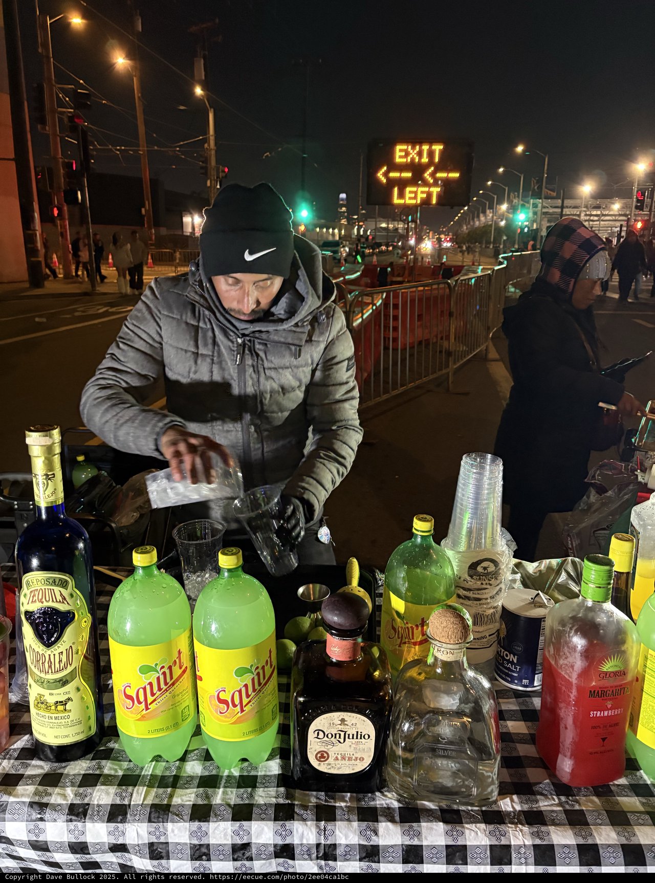 Street Bartender Mixing Drinks at Night Event