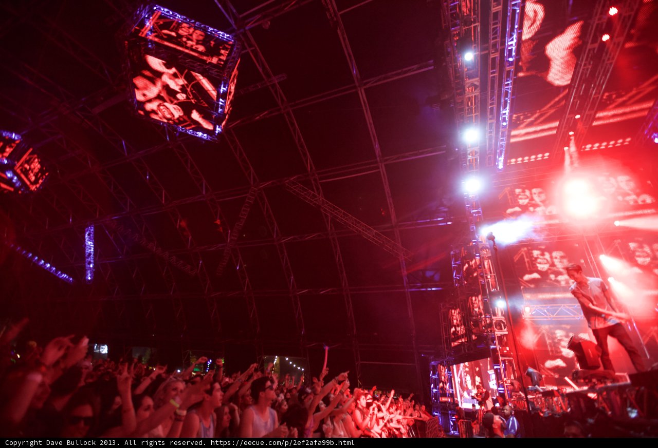 Red Spotlight on the Concert Crowd