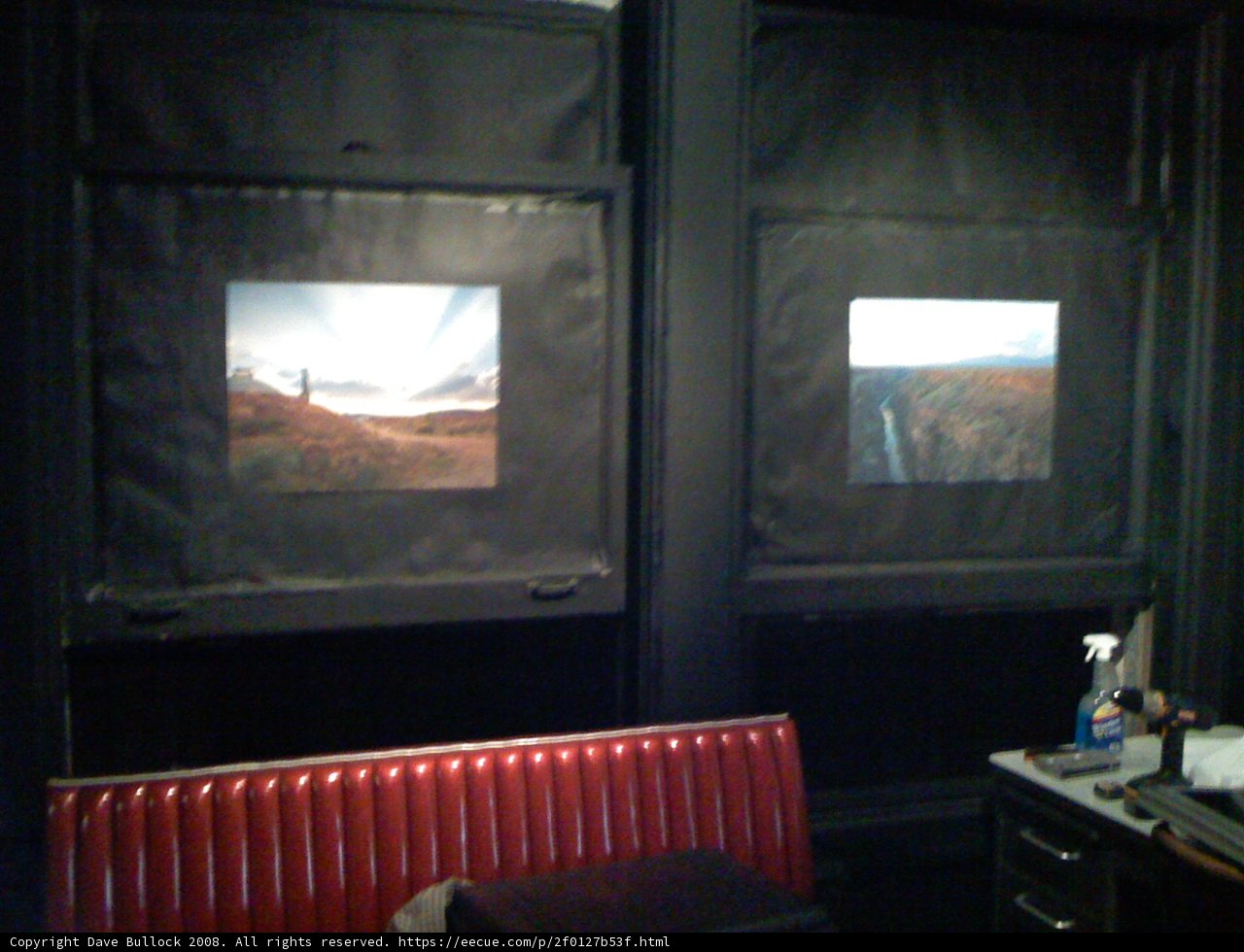 Red Chair in Art-Filled Room