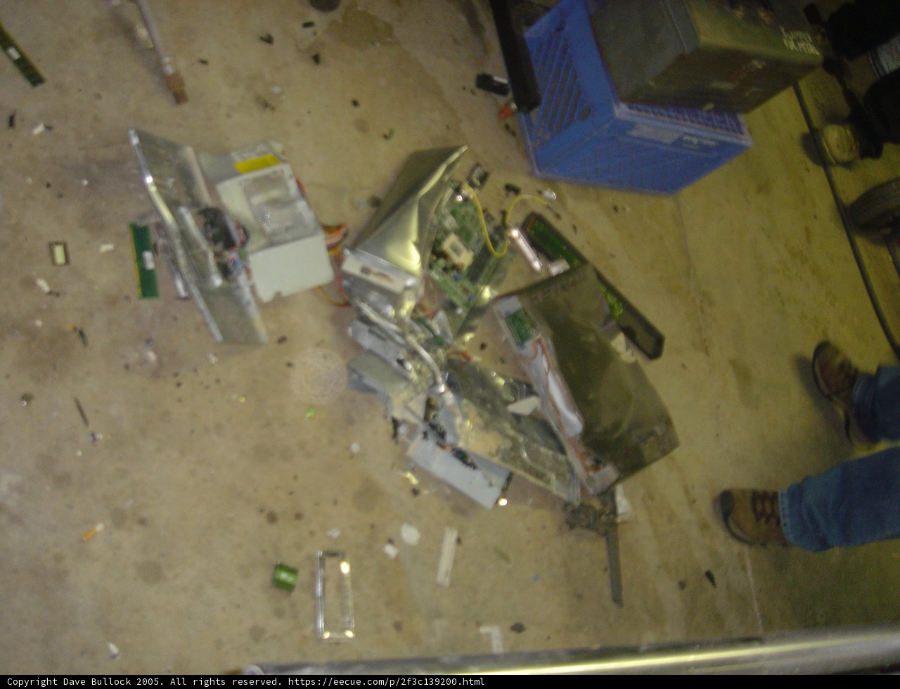 Broken Computer and Abandoned Shoes