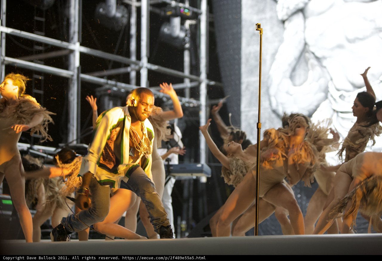 Kanye West Rises to the Stage with Dancers