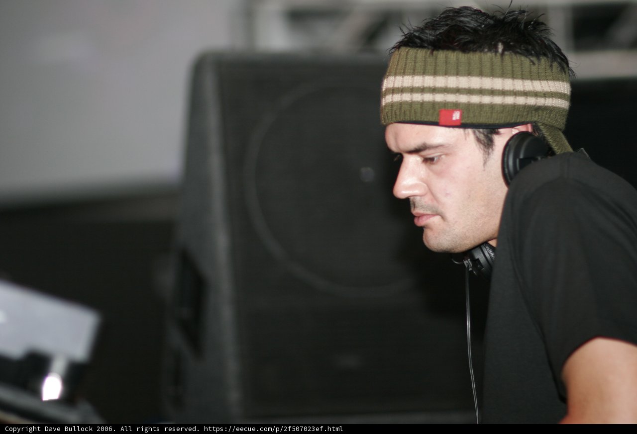 Black Shirted Man with Beanie and Headphones