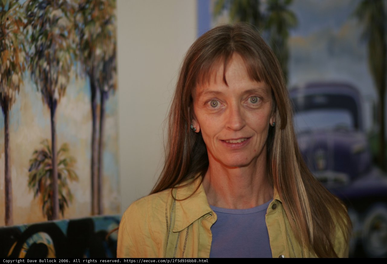 Portrait of a Happy Woman in Yellow Jacket