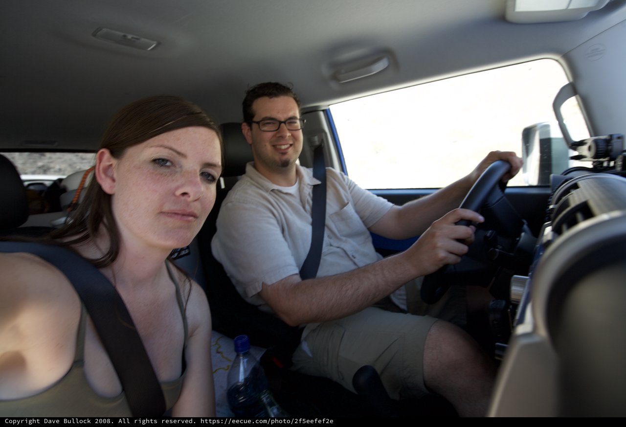 Desert Road Trip Couple Captures Selfie in SUV