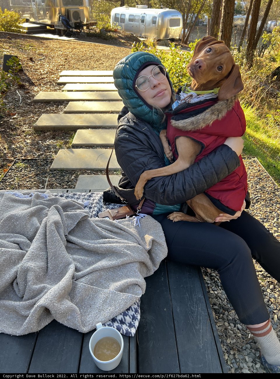 Woman and her furry companion enjoying the Sierra National Forest