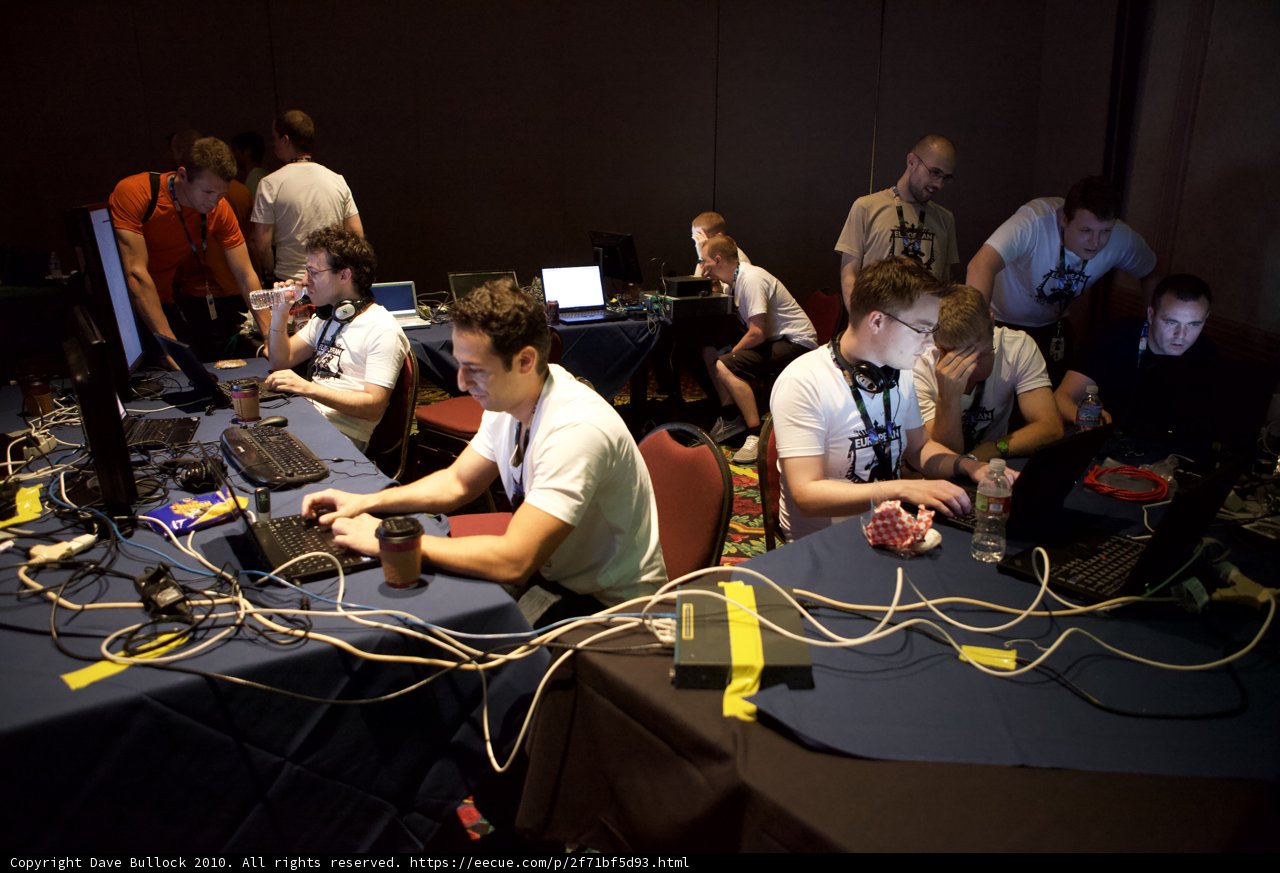 Defcon 18: Seven Men with Laptops at the Table