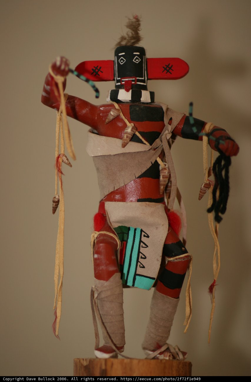 Wooden Pole with Native American Doll