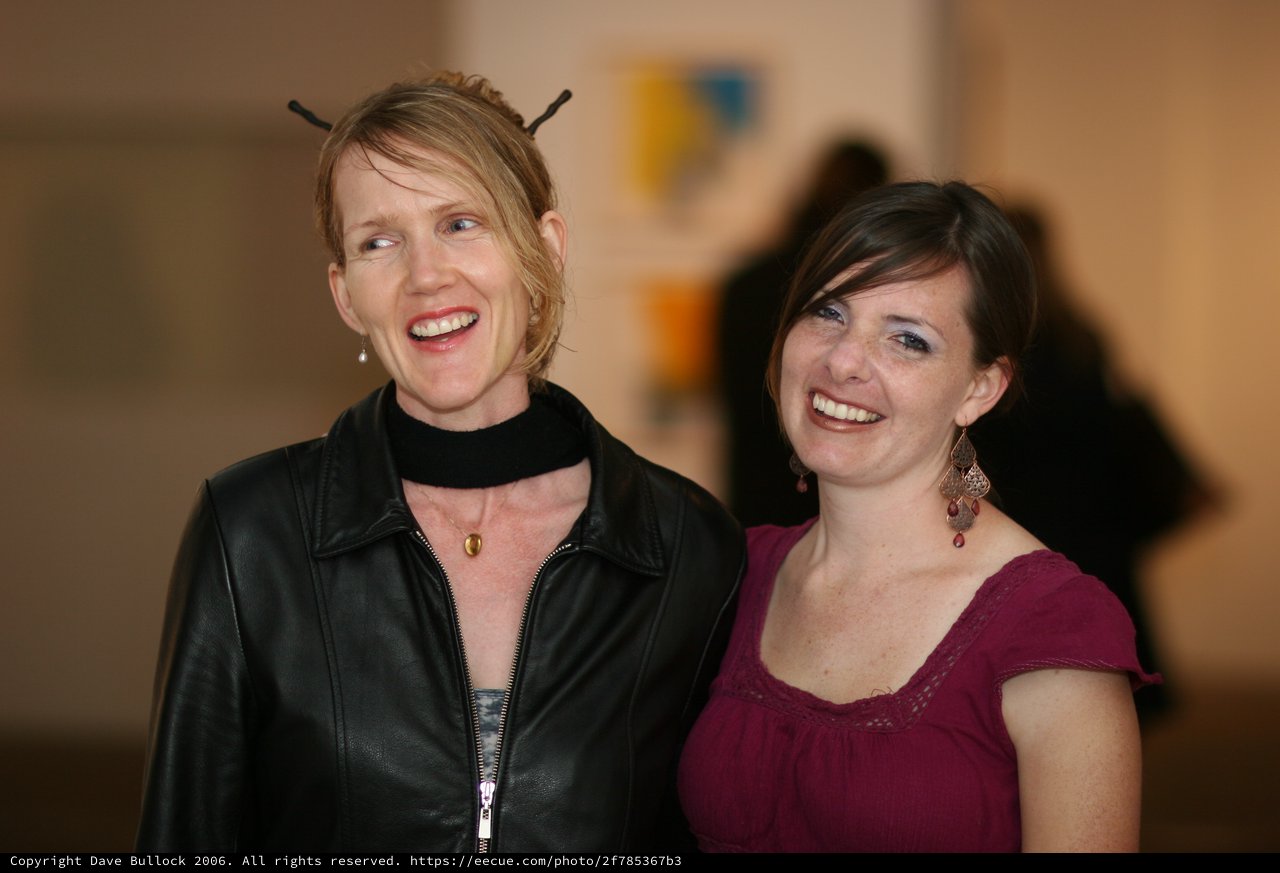 Two Women Laughing at March Art Walk 2006