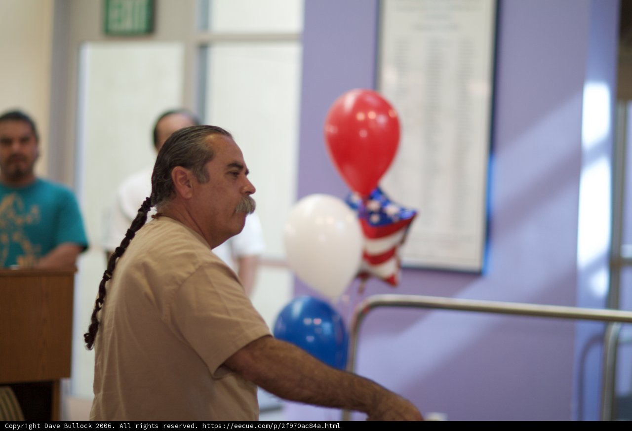 Mohawked Man and Three Balloons