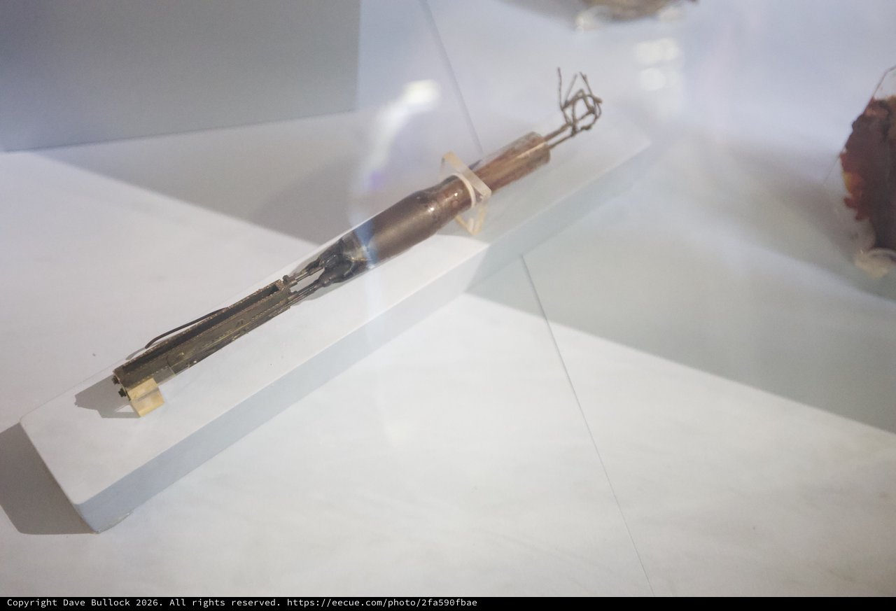 Ancient Bamboo and Metal Tool in Museum Display