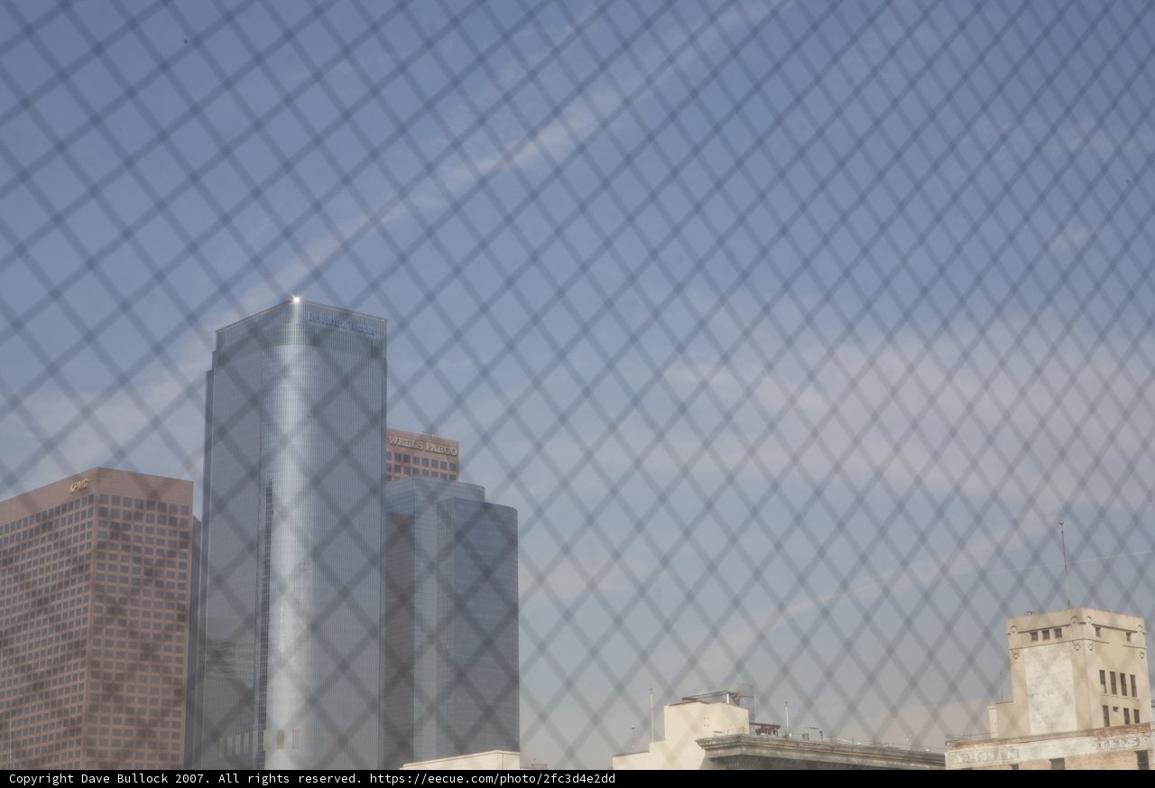 Urban Horizon Viewed Through a Fence