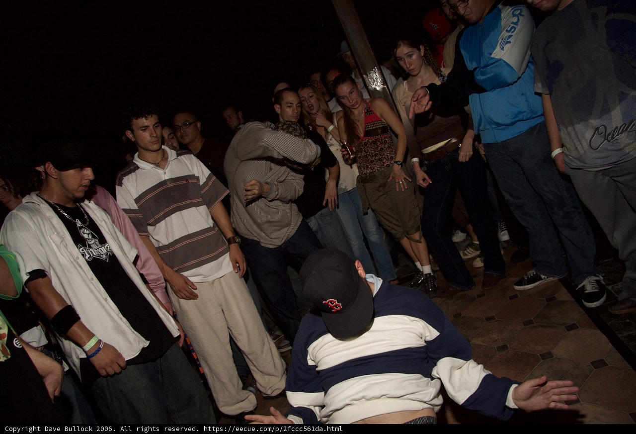Skateboarder in Urban Crowd