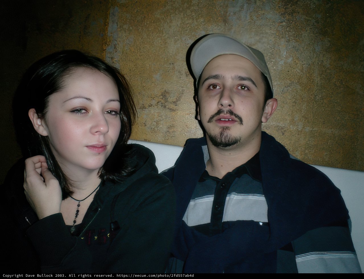 Portrait of Two People on a Couch
