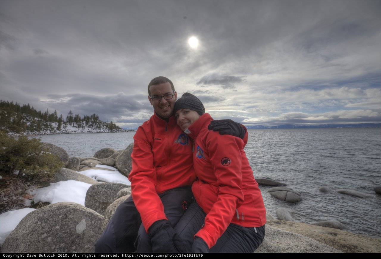 Couple Embracing at Winter Lake Tahoe Shoreline