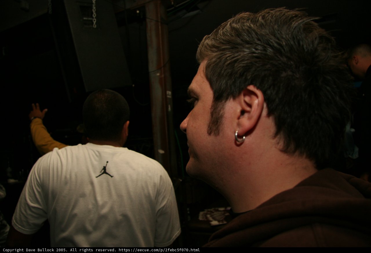 Tattooed Man Standing with a Friend