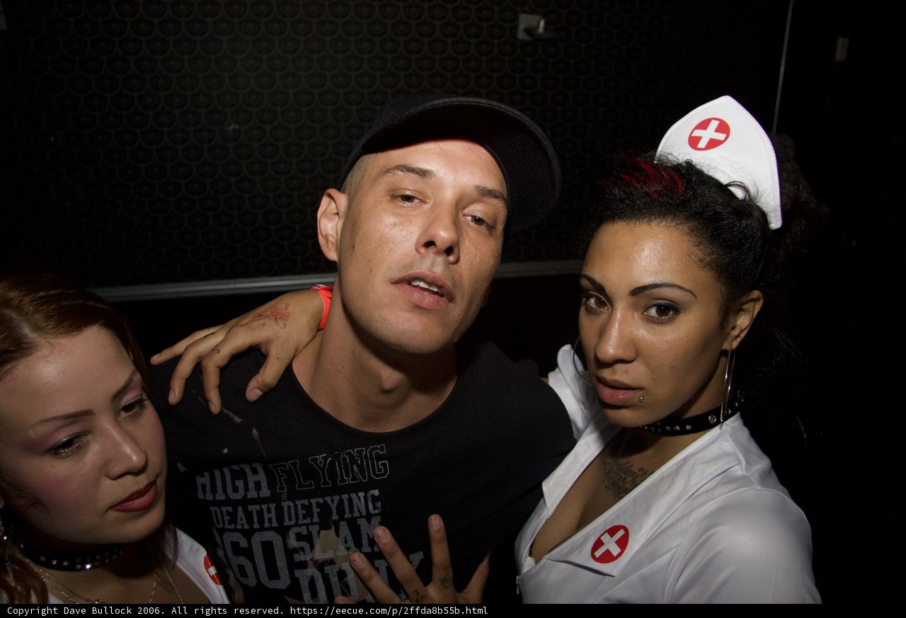 Funky Trio Posing for a Nightclub Photo