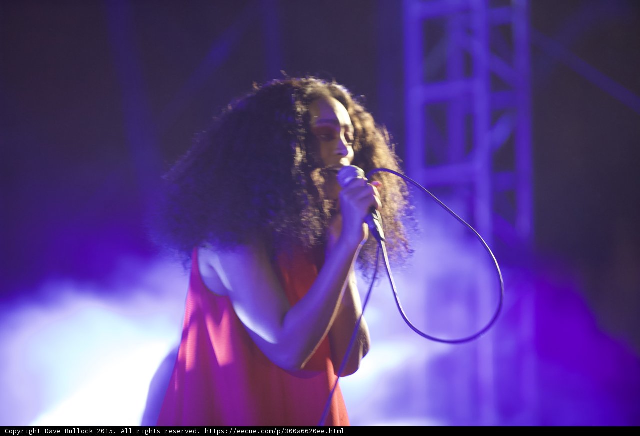 Solange Profile Singing Red Dress Flowing Scaffolding Purple