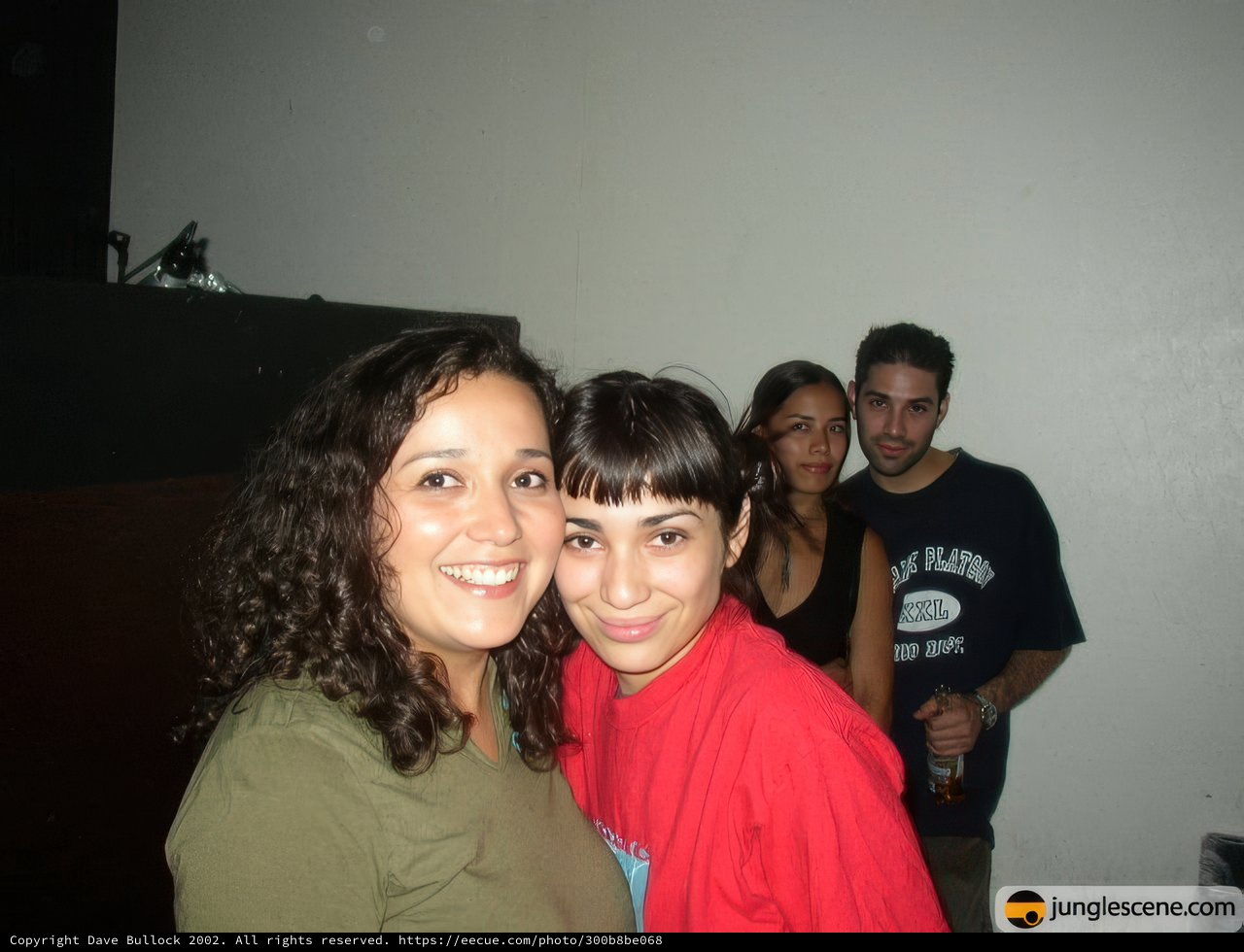 Two Women Strike a Pose in Their T-Shirts
