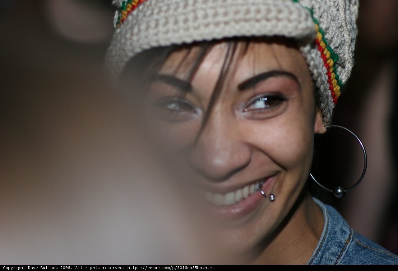 Smiling Woman in a Beanie Hat