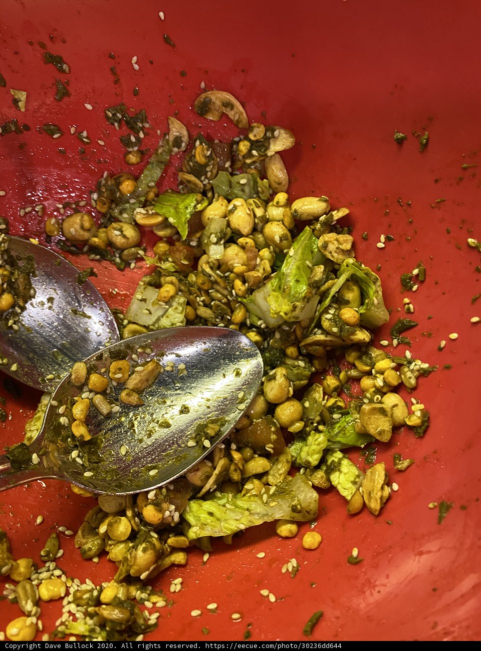 Red bowl of lentil and seafood stew