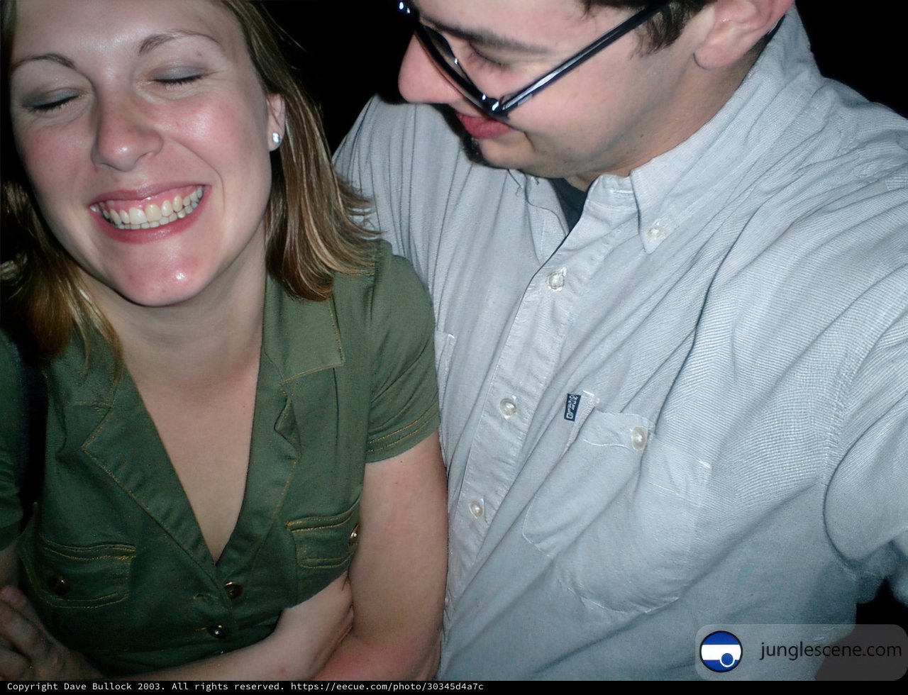 Smiling Couple in Glasses