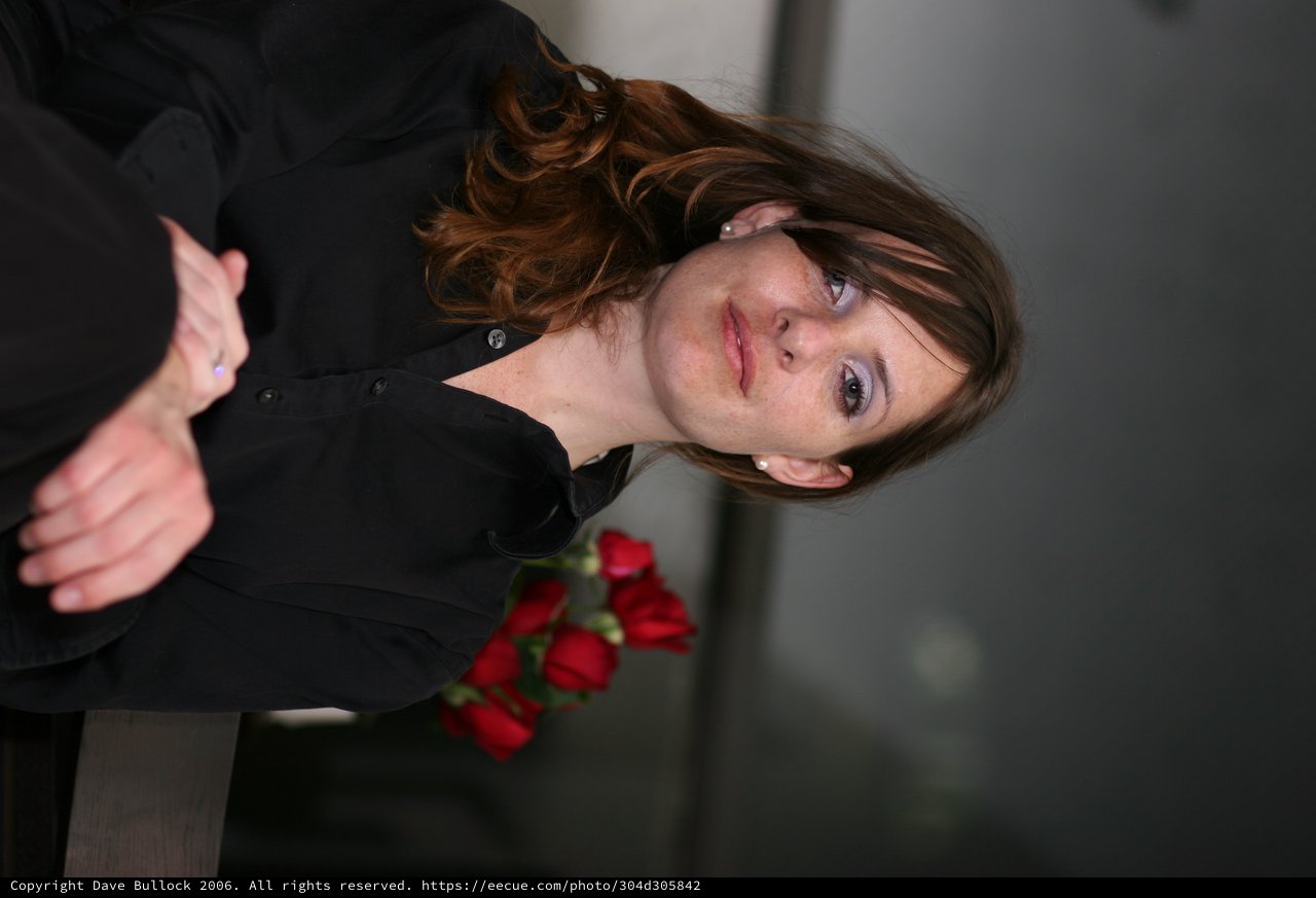 Penelope: Contemplative Portrait with Red Roses