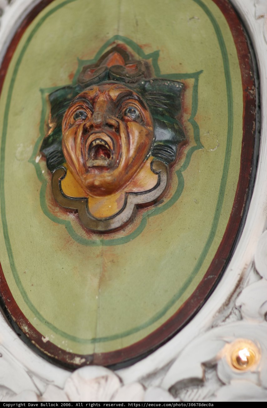 Decorative Face in Monastery Wall