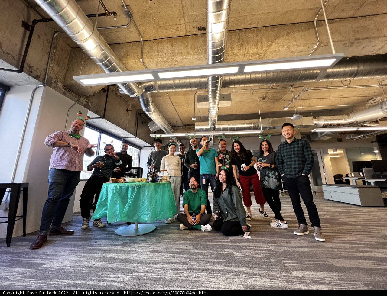 Group Gathering with Green Tablecloth