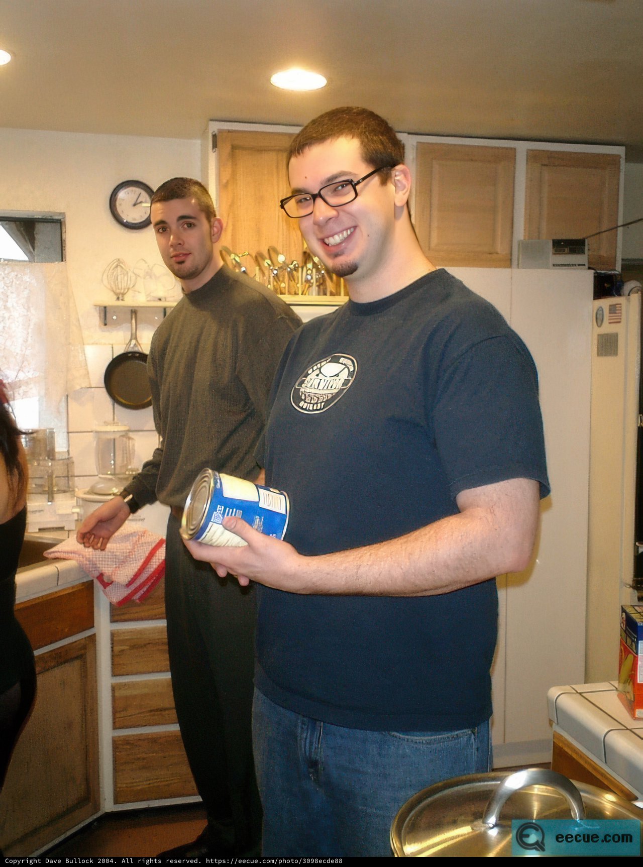 Man Holding a Can of Food