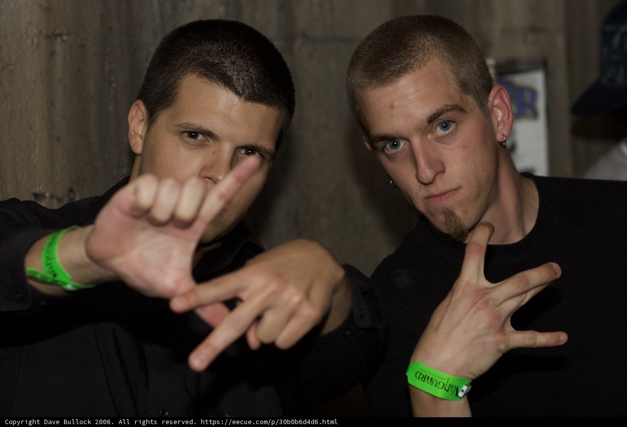 Two Men Strike a Pose