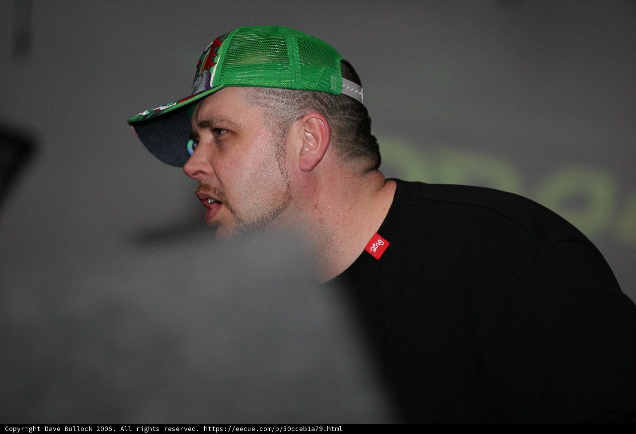 Green Hat, Black Shirt