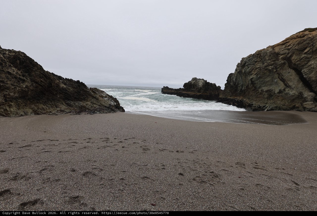 Secluded Cove Between Rocky Cliffs at Dusk