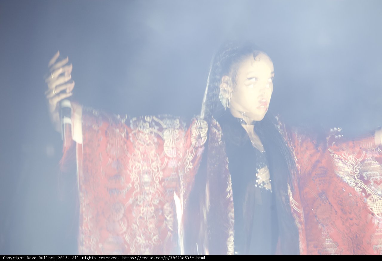 FKA twigs Motion Blur Arms Wide Red Brocade Kimono Flowing Baby Hairs Dramatic Pose