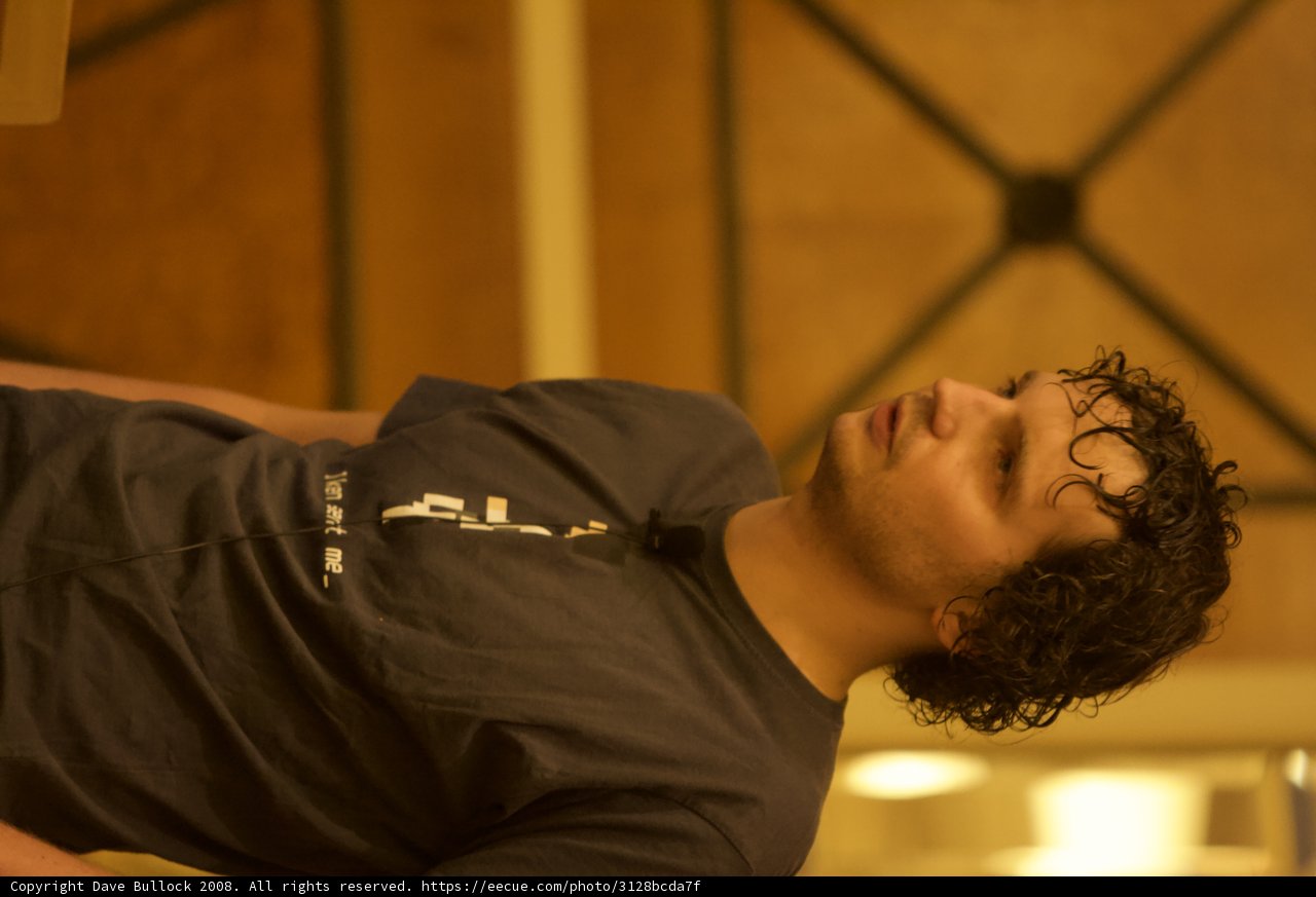 Curly-haired man
