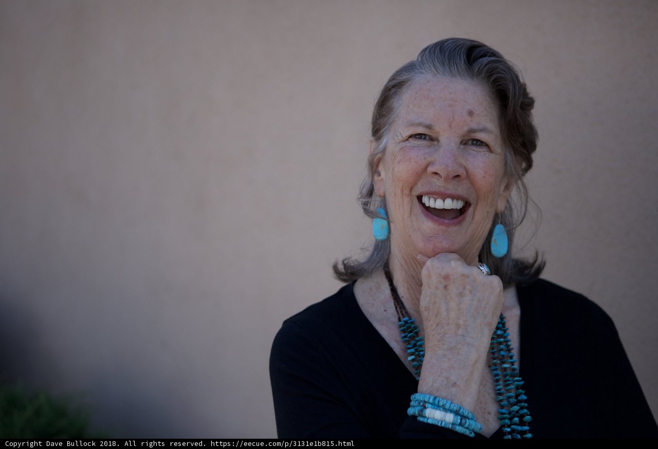 Blue Earrings and a Bright Smile