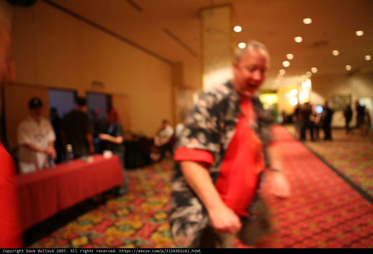 Man in Red Shirt in a Formal Living Room