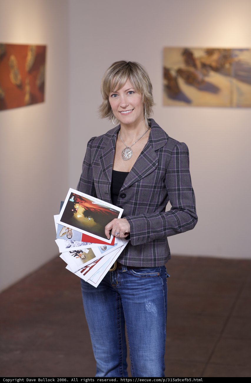 Woman Contemplates Art in Gallery
