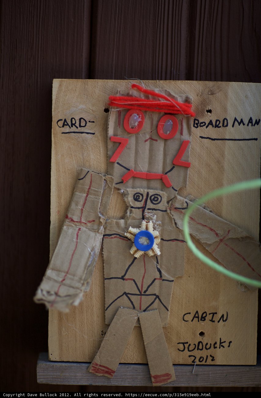 The Red-Capped Cardboard Cutout