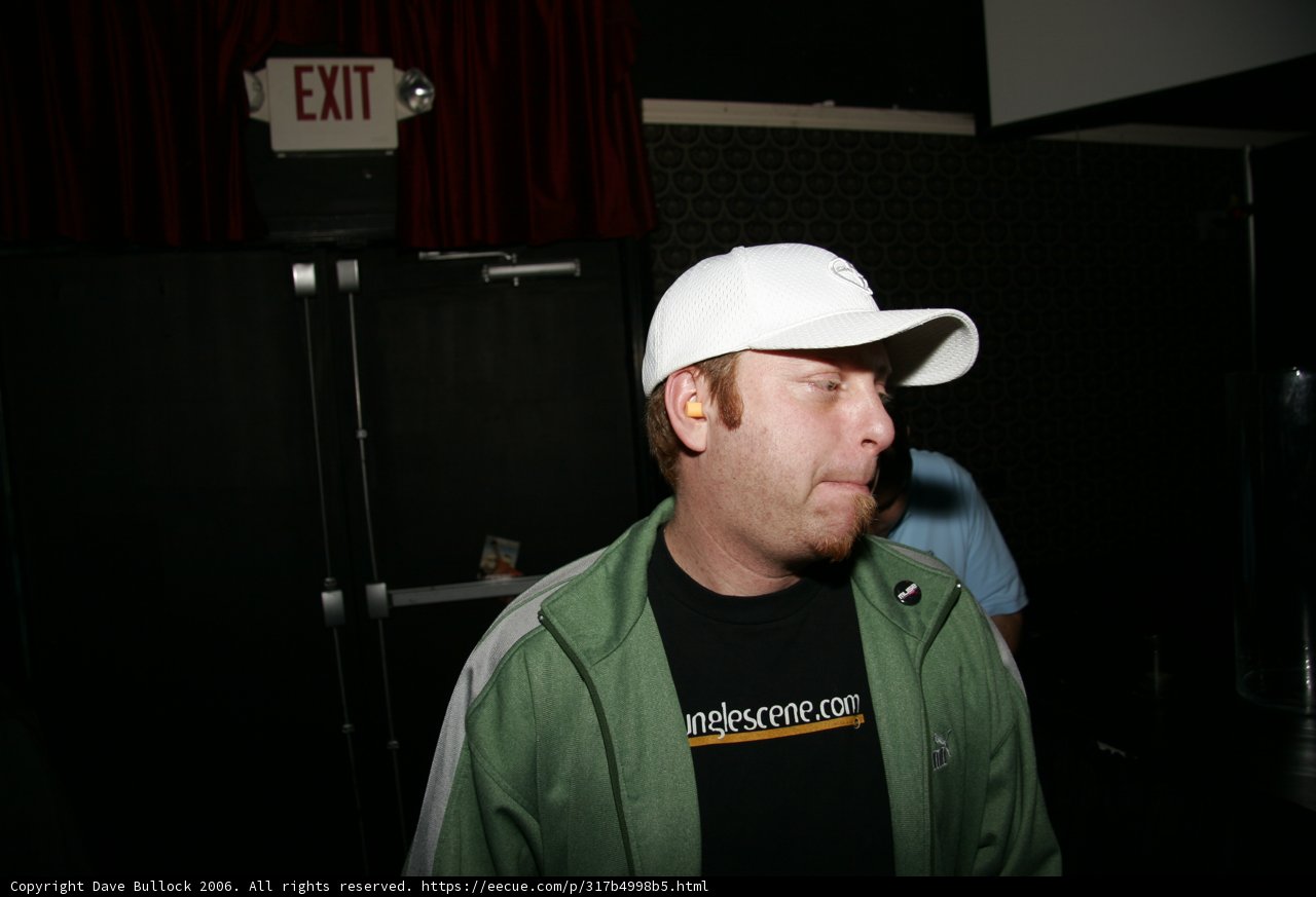 Randy J in Green Jacket and Baseball Cap