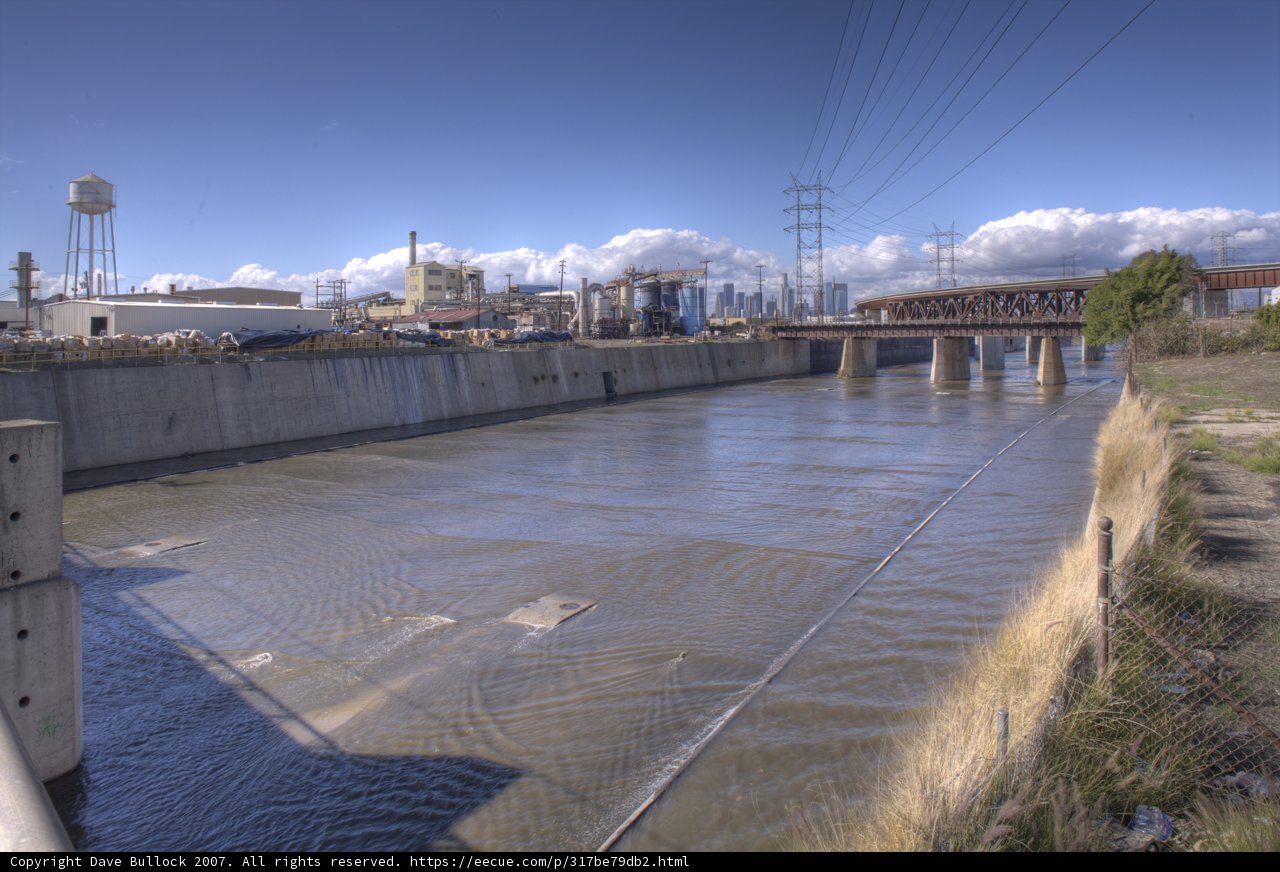 Serene River Flowing Through the City