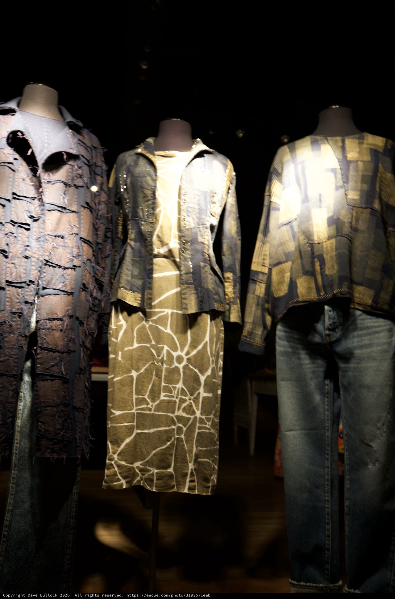 Contemporary Fashion Exhibition Display with Textured Garments
