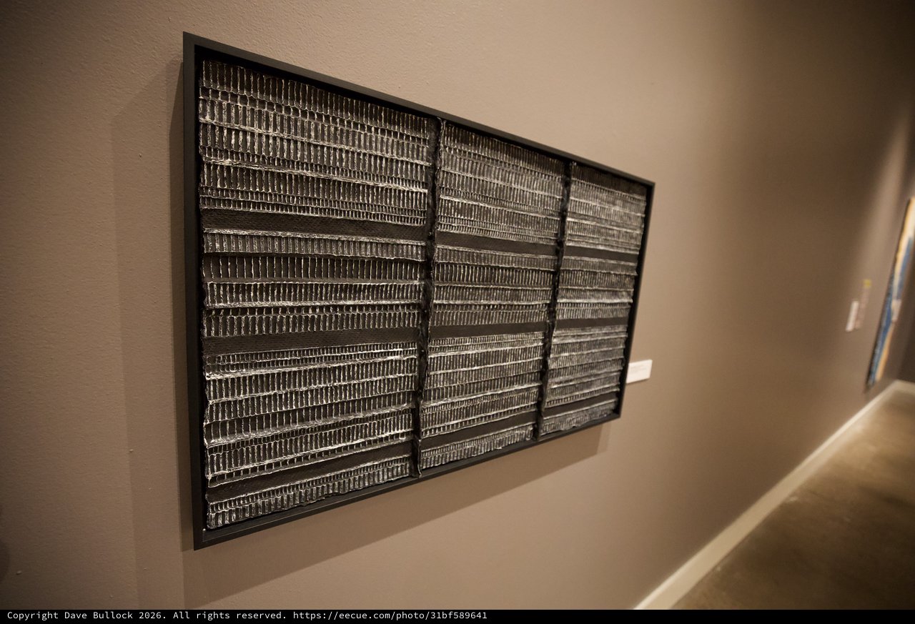 Framed Metallic Textile Art with Geometric Pattern Display