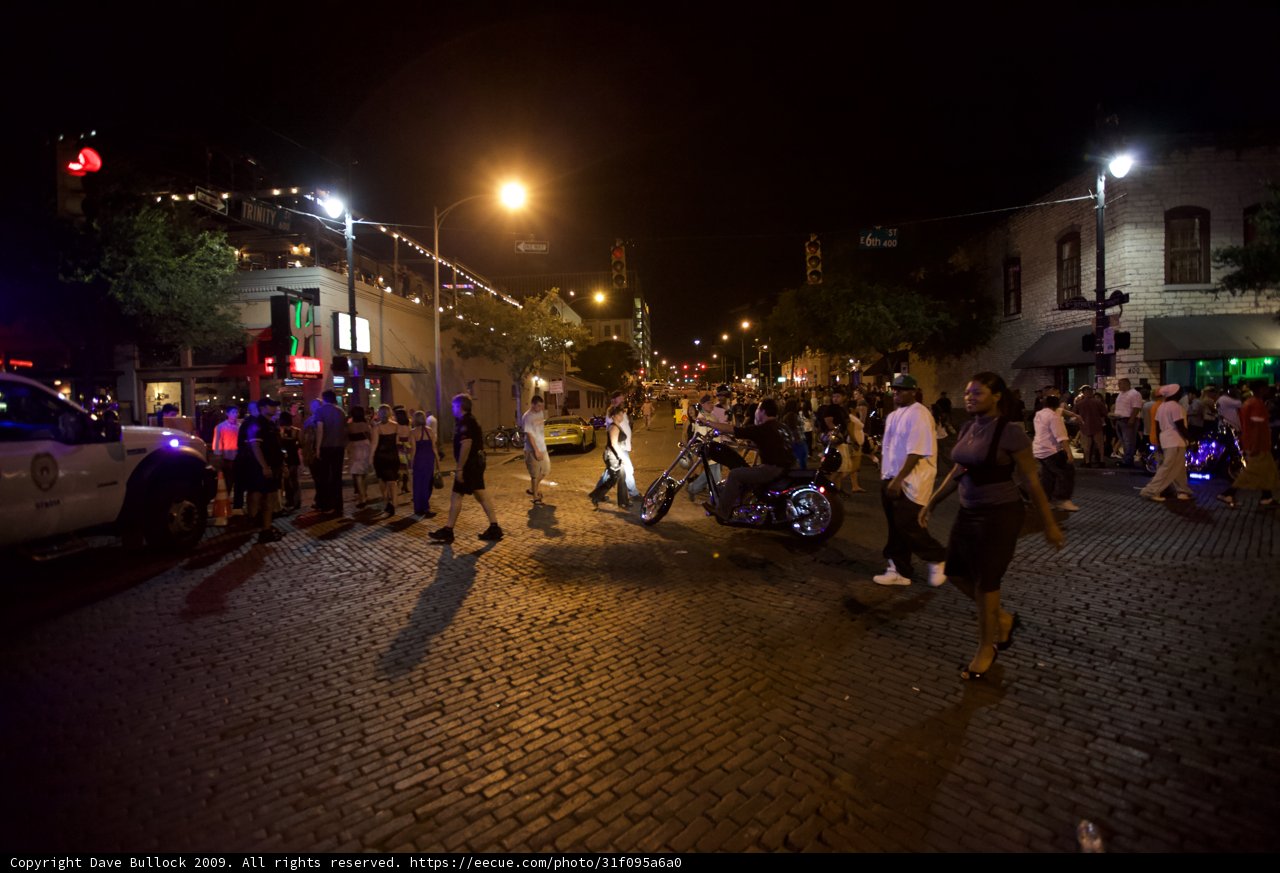 Nighttime Crowd on Austin's Cobblestone Streets