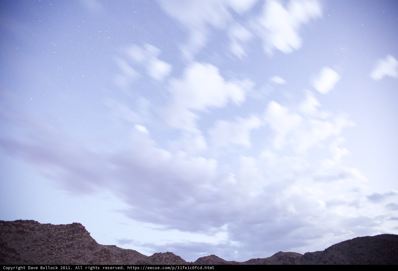 Majestic Mountain Range Under a Dramatic Sky