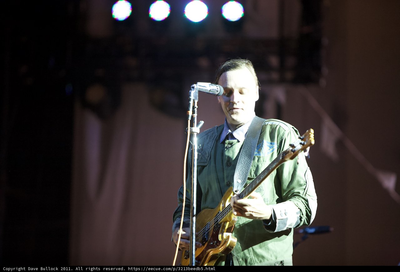 Win Butler rocks the stage with his guitar