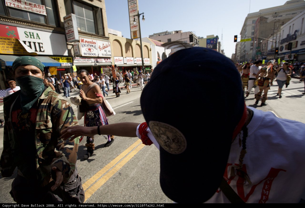 May Day Protester Conceals Identity